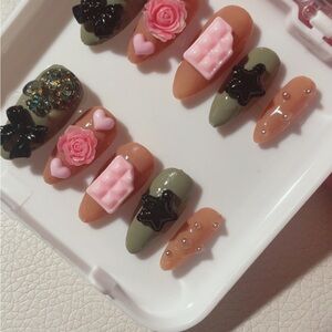 Decorative Nail Art Set with Pink and Black Accents